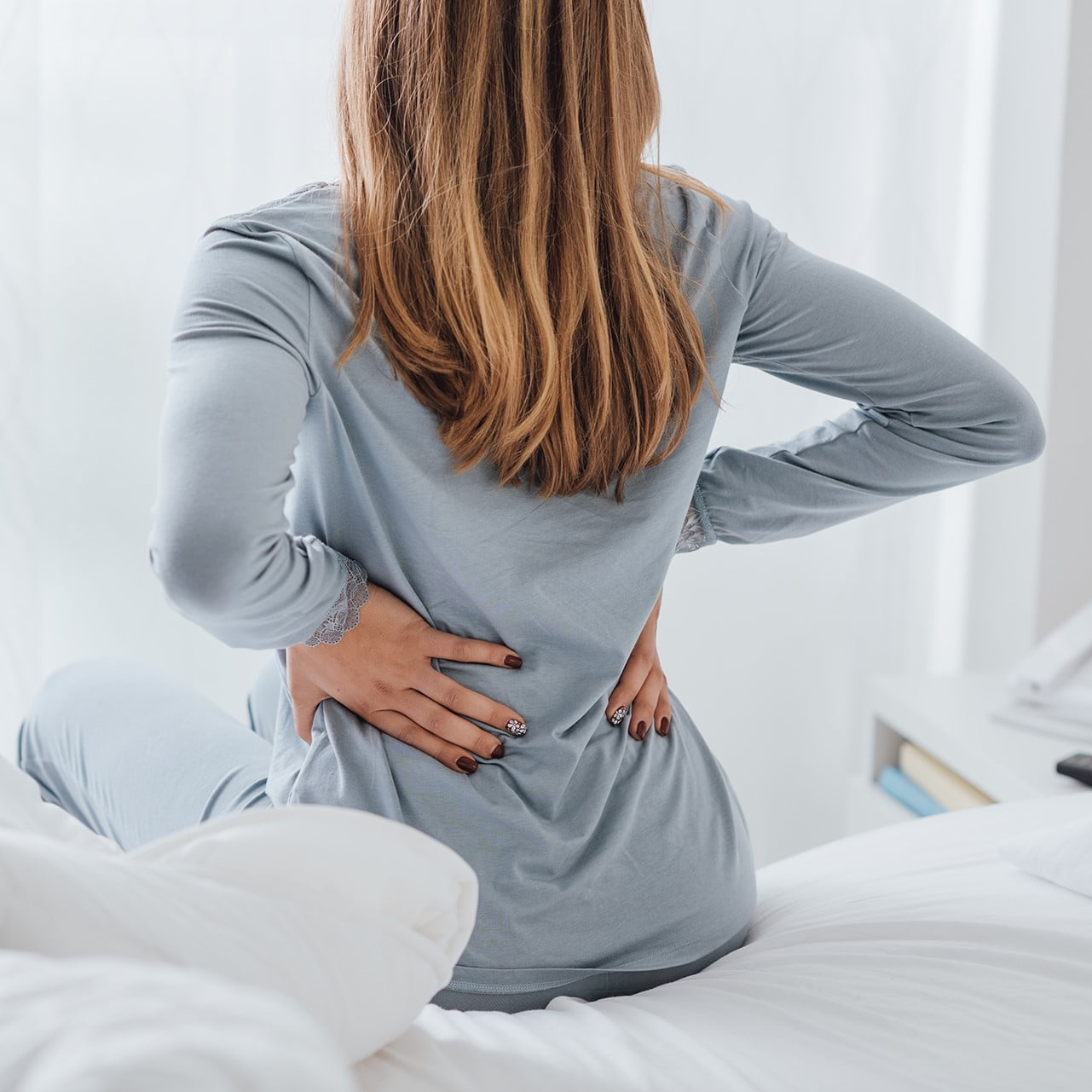 Woman with back ache