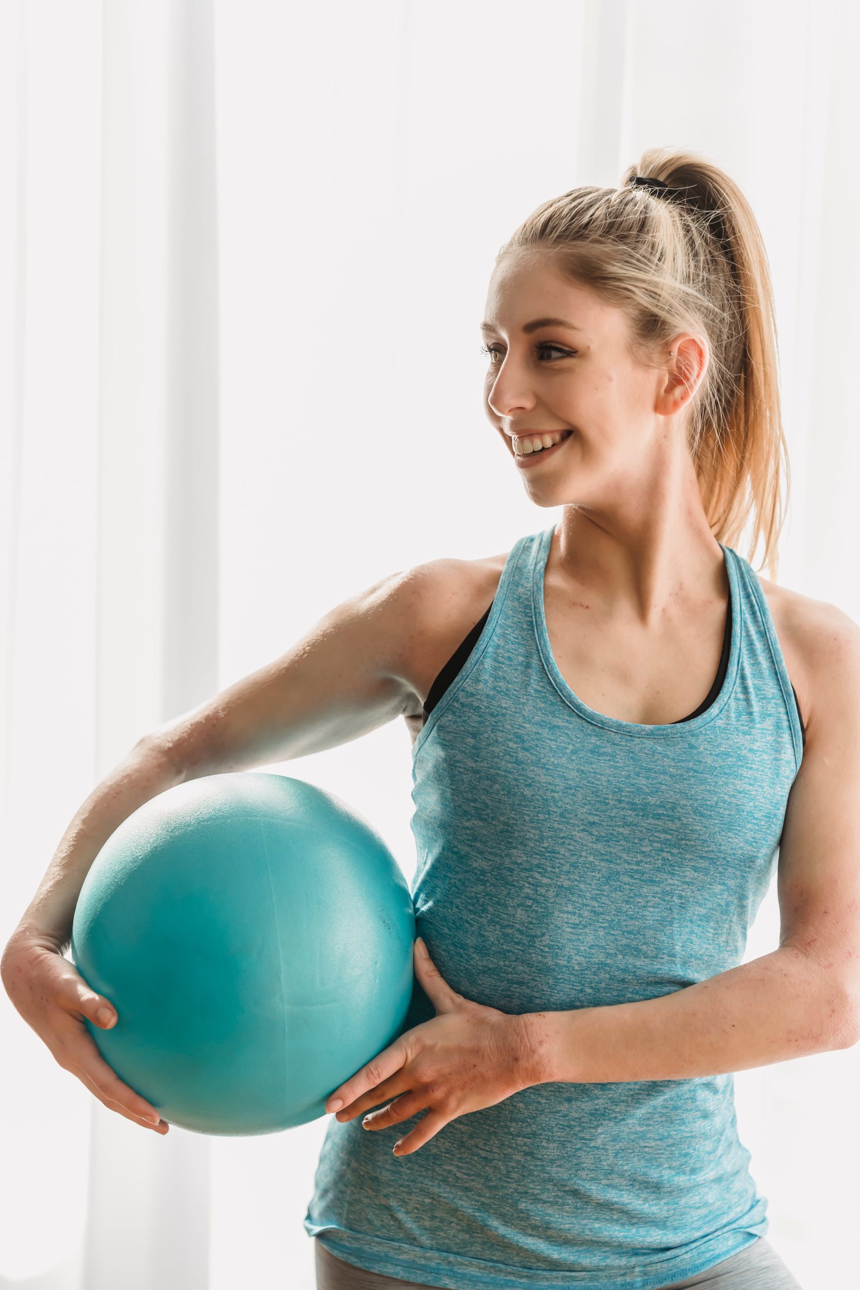 Woman working out with a medicine ball