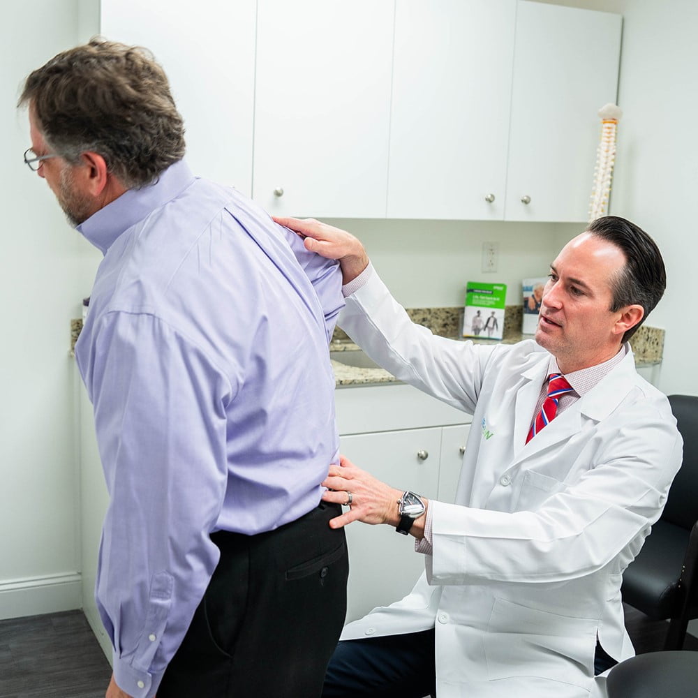 Doctor checking on a patient