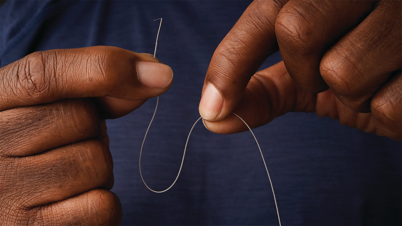 Hands Holding MicroLead