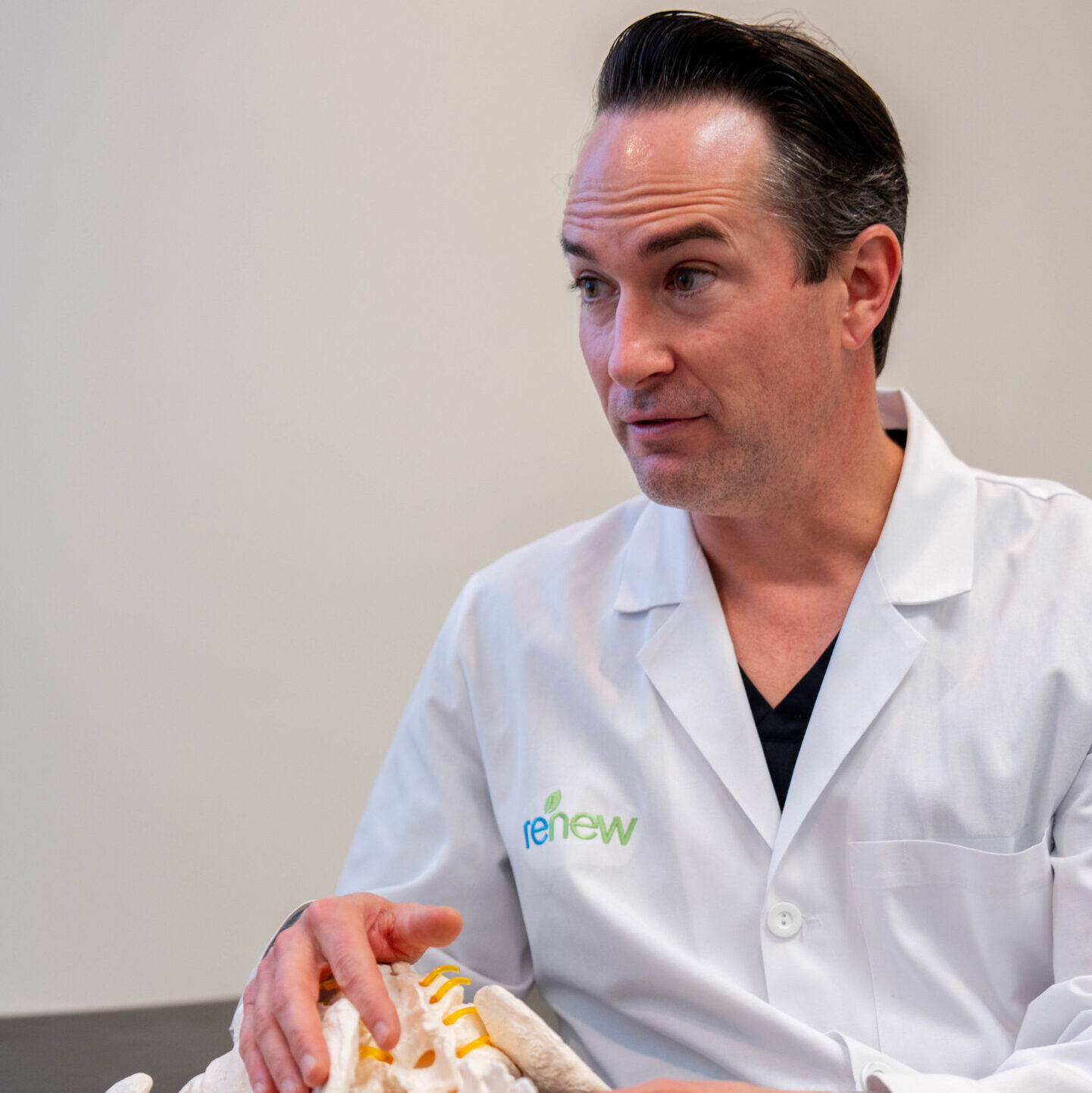 Dr. Smith with spine model